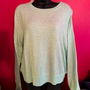 Size L . Brand is by Mia & Tess. Beautiful speckled sweatshirt. Super soft.